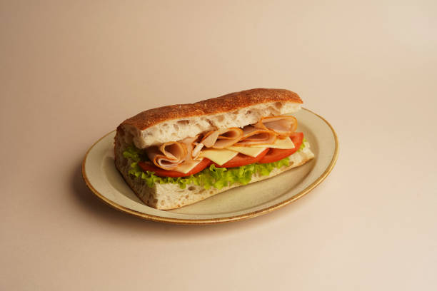 istock Sandwich with ham, lettuce and tomato 1474773519
