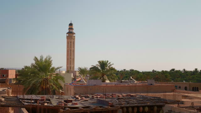 Minaret of mud brick mosque in Tozeur city of Tunnis.