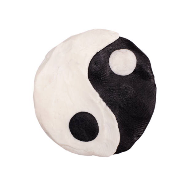 Plasticine black and white yin yang sign isolated on white, harmony concept