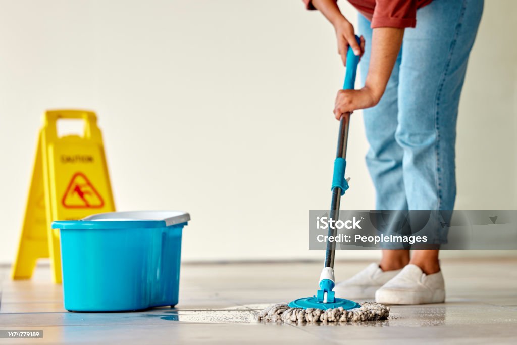 https://media.istockphoto.com/id/1474779189/photo/cleaning-sign-and-woman-mopping-floor-in-office-for-hygiene-health-and-wellness-spring.jpg?s=1024x1024&w=is&k=20&c=3kf18QxDQcICyGTVqmaindaz-KiDabcxDWVl73Bj0Xs=