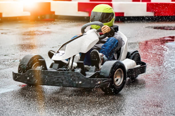 istock Young racer takes part in children's karting competitions 1474780430