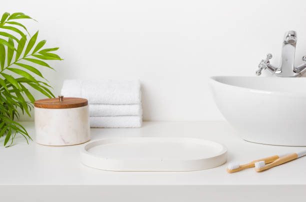 istock Bathroom sink table with empty stand and morning hygiene accessories 1474781973