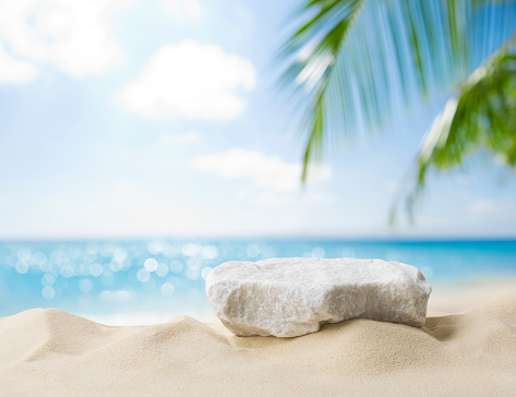 istock Summer sand and tropical sea background with abstract stone podium 1474781987