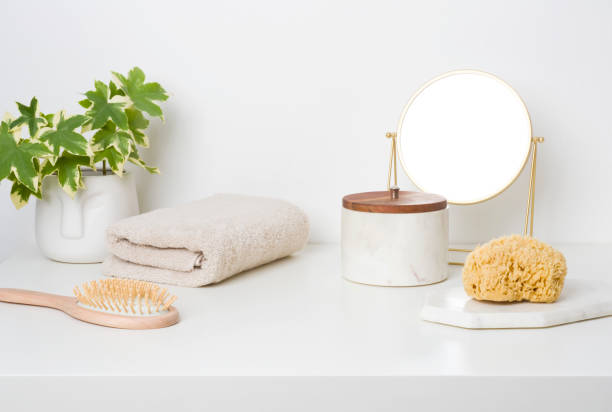 istock White table top in bathroom with bathing accessories and toiletries 1474781994