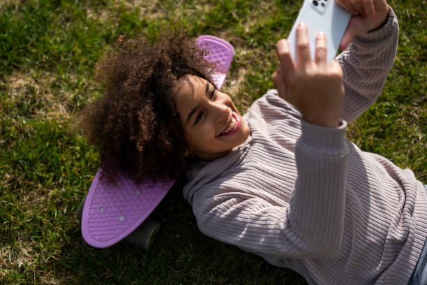 istock Girl with smart phone 1474782807