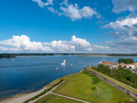 Aerial view with view over Veerse Meer in front of Veere. Veere is a city in the province of Zeeland in the Netherlands