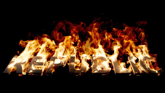 Low-angle view of Republic Word on Fire with High Flames on a Black Background