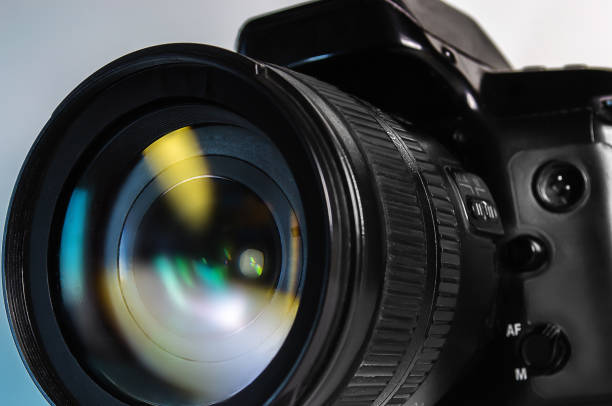 istock camera and photo lens close up 1474784492