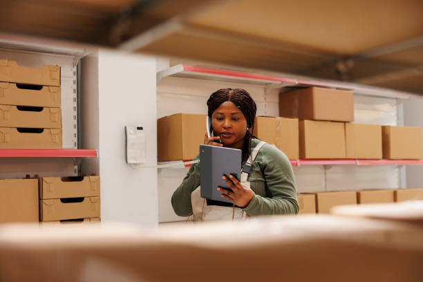 istock African american worker talking at landline phone 1474786754