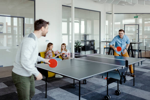istock Colleagues Playing Ping Pong Table Tennis 1474788165