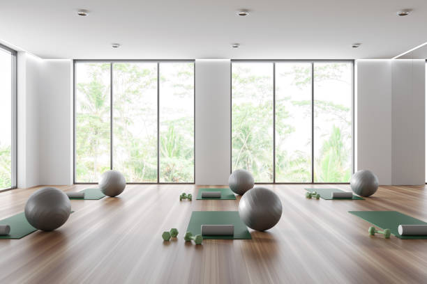 istock White sport interior with yoga equipment and panoramic window 1474790460