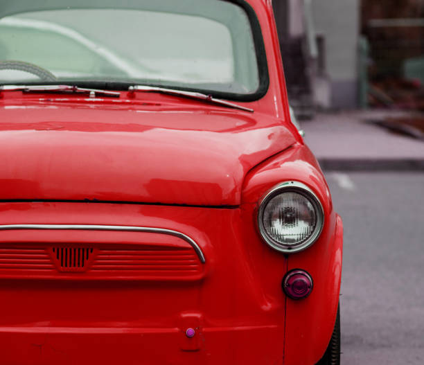 istock front view of a bright retro car. 1474791433