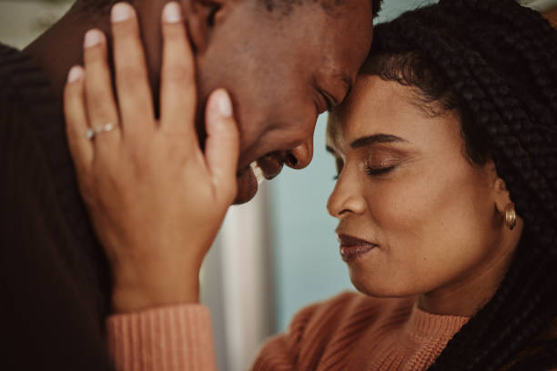 istock Black couple, home and love while happy together within a marriage with commitment, happiness and care. Face of man and woman with trust and support while in kitchen to bond in a house or apartment 1474791815