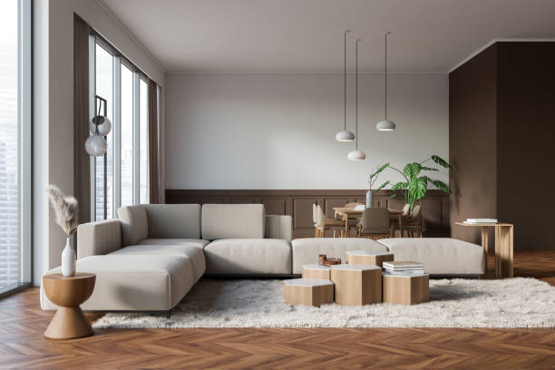istock Stylish living room interior with soft place and eating area, panoramic window 1474792176