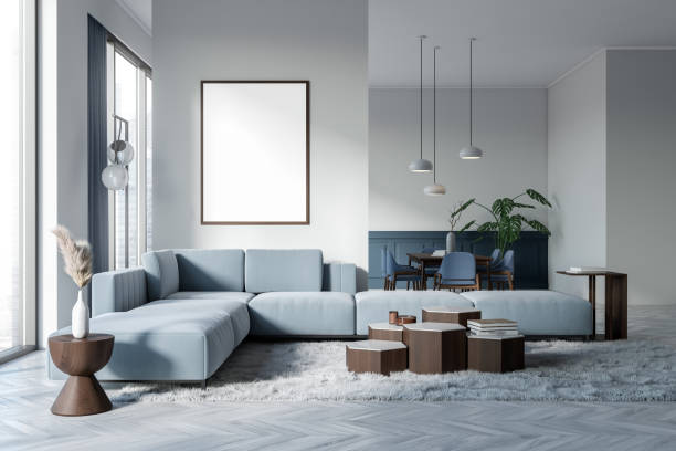istock Modern living room interior with couch and eating zone, window and mockup frame 1474792944