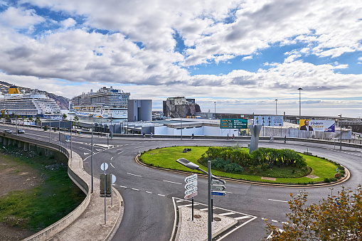 Funchal, Portugal - November 21, 2022: pedestrians and roundabout on the Rotundo do Porto in Funchal.