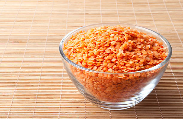 istock glass bowl full of red split lentils 147479507
