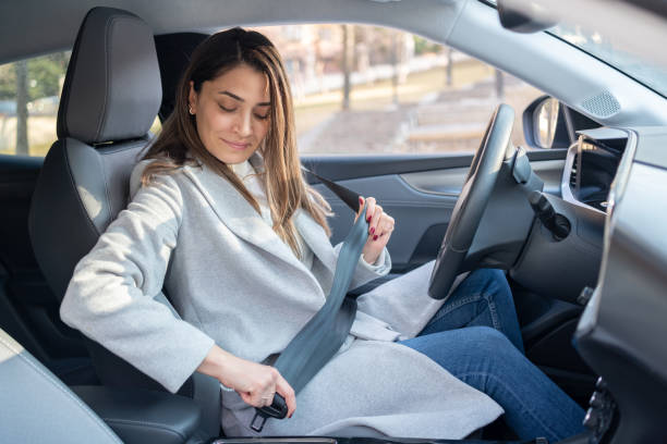 istock Putting On Safety Seatbelt 1474797515