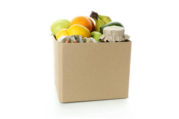 istock Donation box with food isolated on white background 1474797720