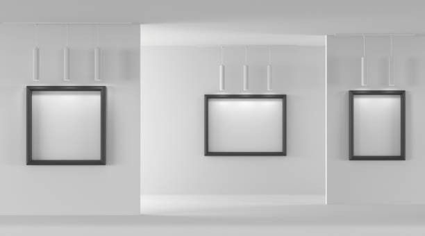 istock 3D Empty gallery with blank picture frames on walls and pendant ceiling spotlights. Realistic interior of museum or artwork exhibition with white posters in black borders and lamps 1474799311
