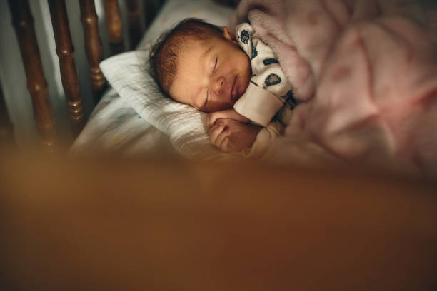 istock Sleeping newborn baby girl 1474800520
