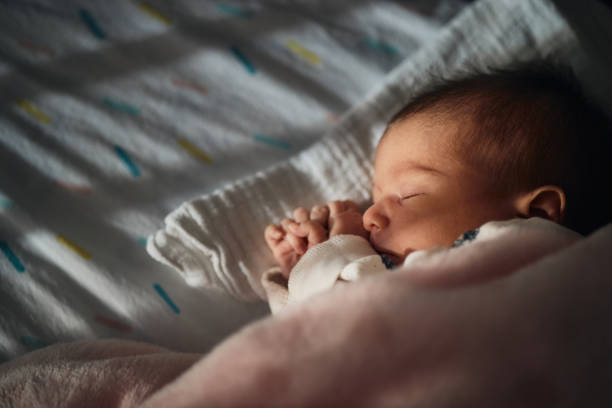 istock Sleeping newborn baby girl 1474800531