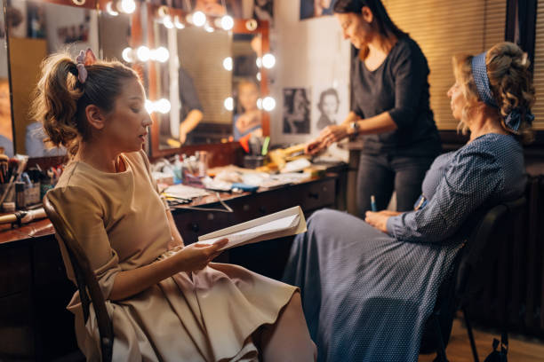 istock Actresses in costumes prepare for the show backstage 1474800877