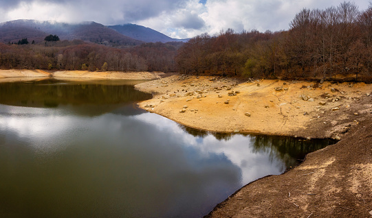 Landscape, lake Santa Fe del Montseny, Mountain Montseny in Catalonia in Spain. Very little water in the reservoir.