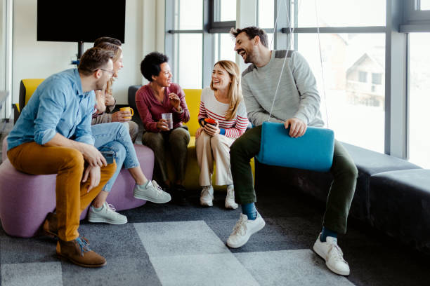 Colleague Taking Break in Modern Office Break Out Area