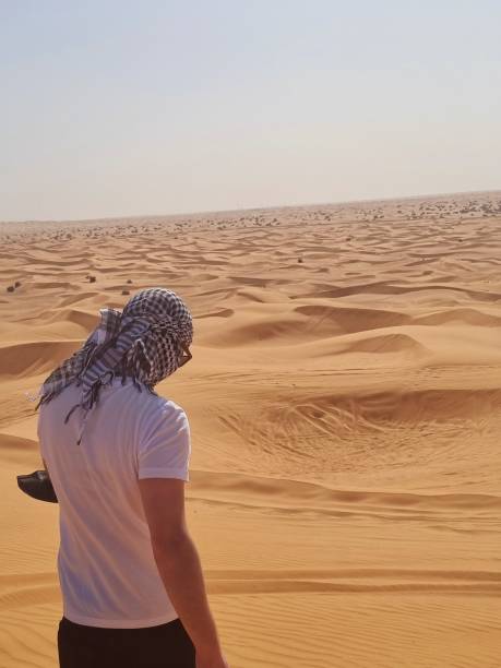 istock Person in the dessert 1474805237