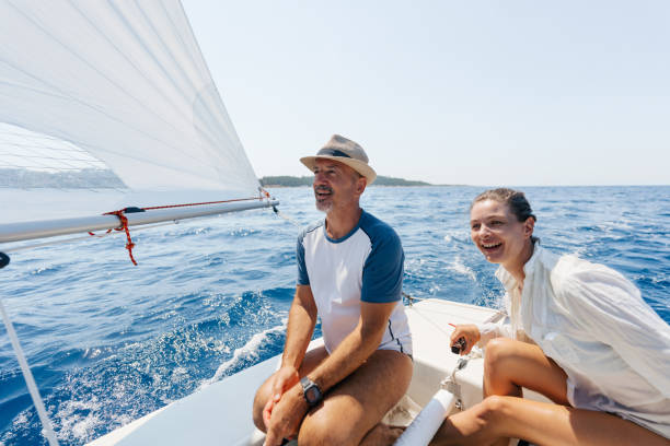 istock Mature couple sailing on the open sea 1474806567