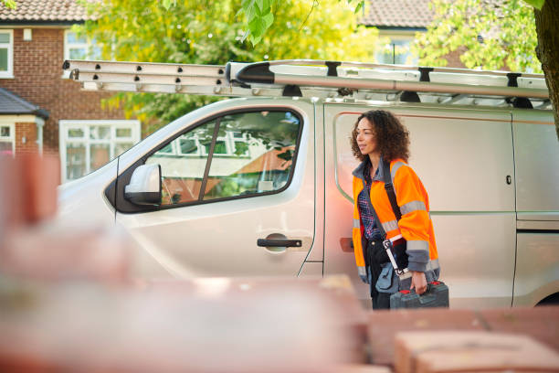 istock female contractor arrives at job 1474806598