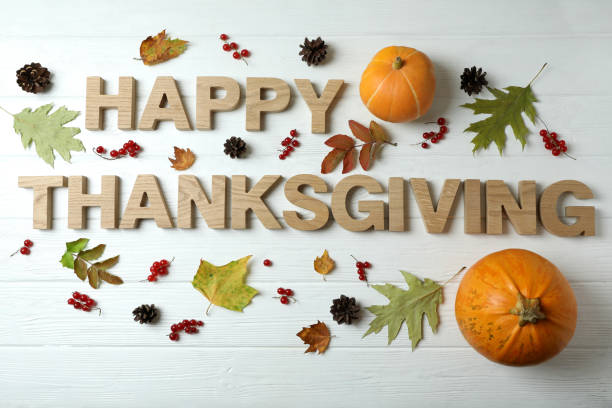 istock Happy Thanksgiving Day composition on white wooden table 1474806930