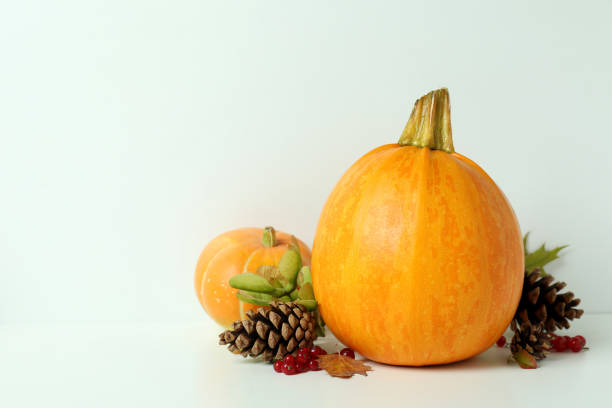 istock Thanksgiving Day composition with pumpkins on white table 1474806979