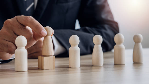 istock HR,human resources technology.Human resource manager choose the perfect employee for his business.Management and recruitment business concept. 1474808524