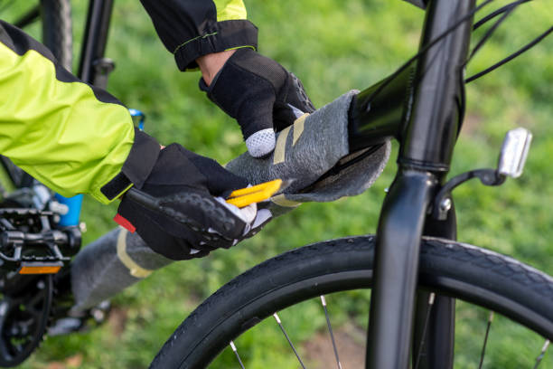 istock a man has bought himself a new bike and is preparing it to ride 1474809549