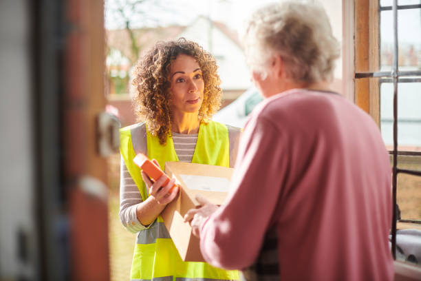 istock parcel for senior woman 1474809859