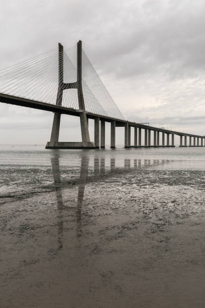 istock The Vasco Da Gama bridge on a cloudy day 1474815792