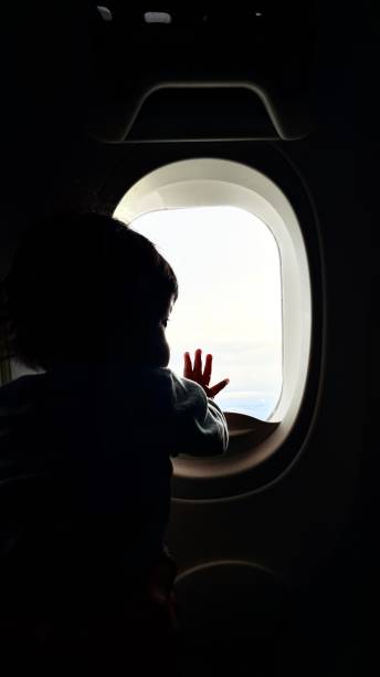 istock My baby standing near the window 1474816371