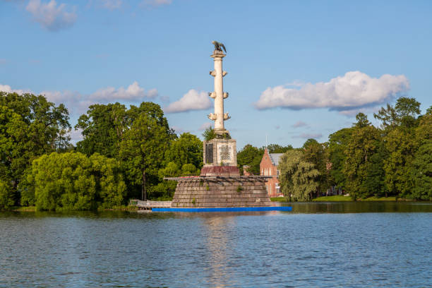 Pushkin, Russia - July 12, 2022: Chesme Column on the island of Grand Pond in Catherine park in Tsarskoye Selo Pushkin, Russia - July 12, 2022: Chesme Column on the island of Grand Pond in Catherine park in Tsarskoye Selo. High quality photo pushkin st petersburg stock pictures, royalty-free photos & images