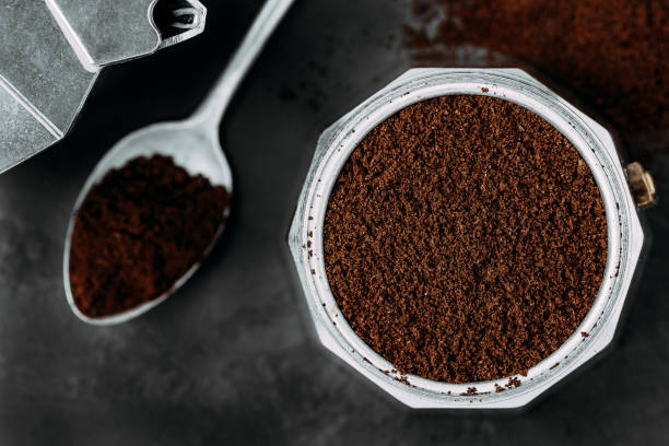 istock Ground coffee. Coffee moka pot make on dark background 1474819266