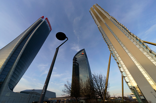 Milan, Italy - January 14, 2023: Citylife, modern park in Milan, Lombardy, Italy, with the Three Towers