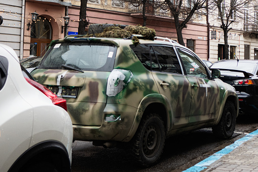 Ivano-Frankivsk, Ukraine - March, 2023: Military car on street city parking.