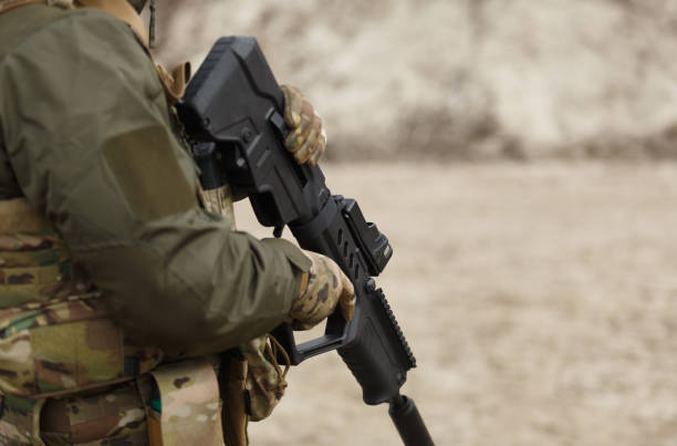 istock Ukrainian soldier equipped with modern bullpup assault rifle training at the shooting range outdoor 1474827579