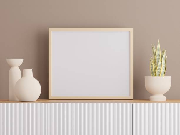 istock Empty poster wood frame mockup in living room interior with light reflection. 3d rendering, 3d illustration 1474828780