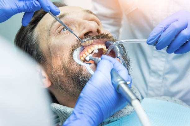 istock Male patient at the stomatologist. 1474828956