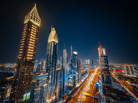 View of Sheikh Zayed Road at sunset in Dubai Downtown Financial center, UAE. High quality photo