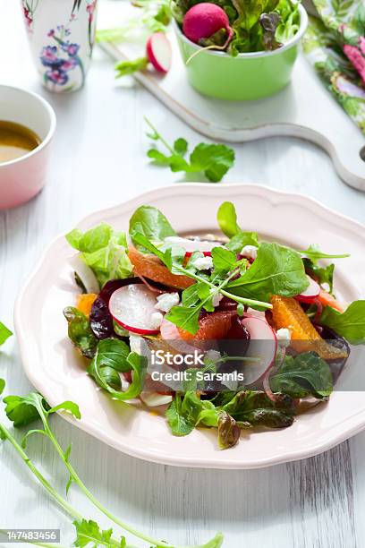 A Beetroot Salad On A Plate On A Table Stock Photo - Download Image Now - Salad, Grapefruit, Common Beet