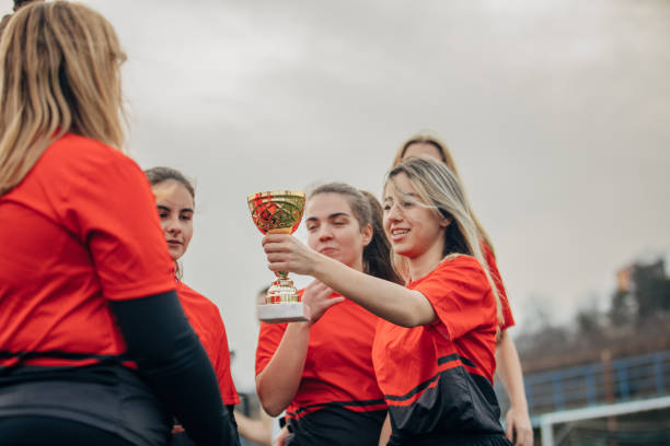 istock Female rugby team won a trophy 1474834596
