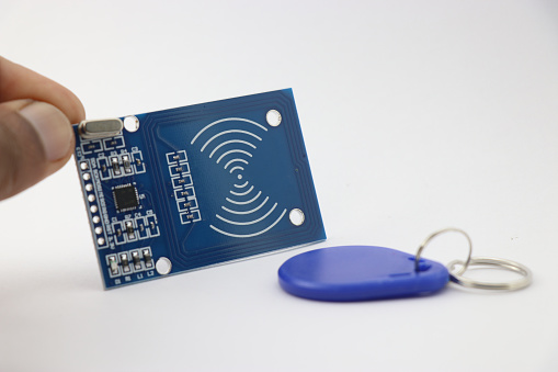 RFID reader module and rfid tag on a white background